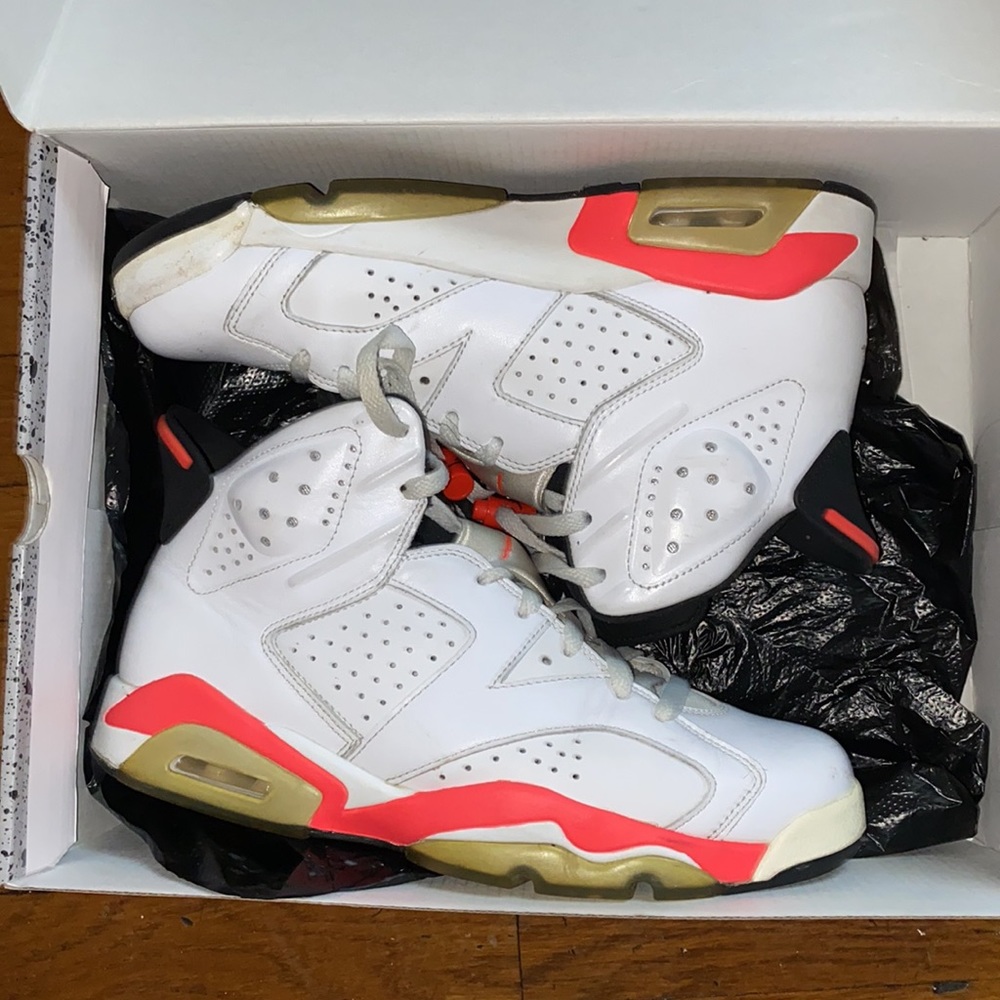 White, Infared and black Jordan 6 sneakers